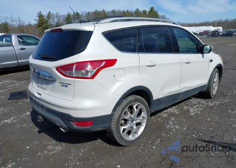 2016 Ford Escape Titanium z USA, uszkodzony, nr VIN 1FMCU9J94GUA89427